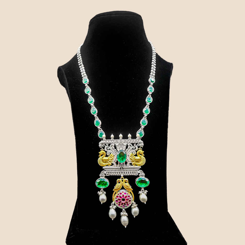 Dual tone necklace with spinels emerald and pearls